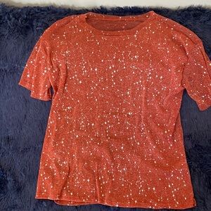 Sheer red shirt with silver star pattern